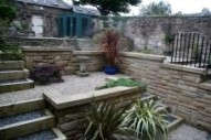 Edinburgh garden designers - note terracing and stone retaining walls.